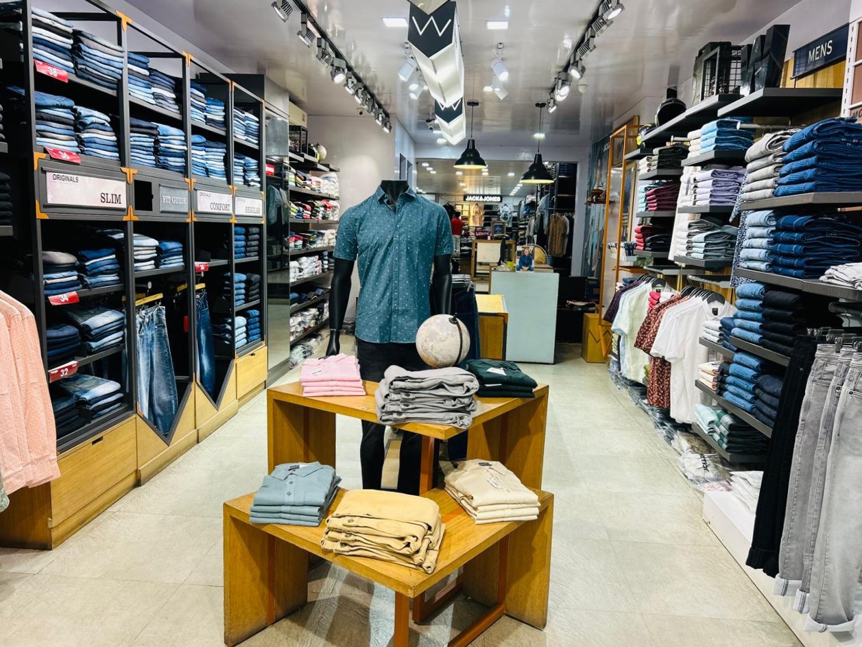 Premium apparel displayed inside a modern clothing store